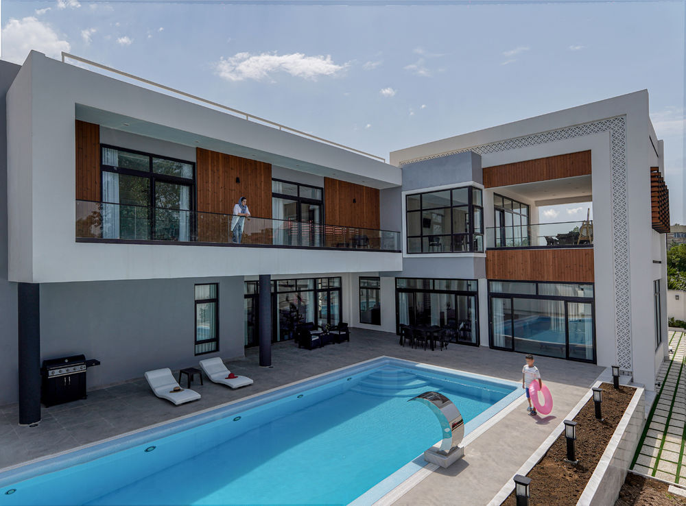 伊朗 Yalda Villa | 利用 L 型空间设计保护隐私的别墅