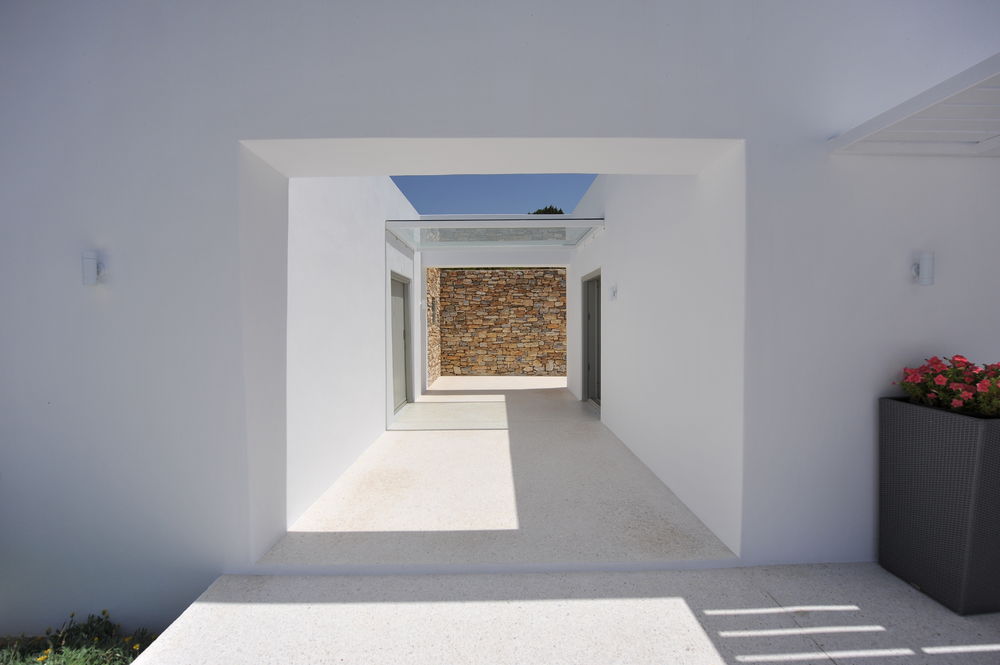 希腊 Paros 岛别墅建筑，融于景观的简约设计