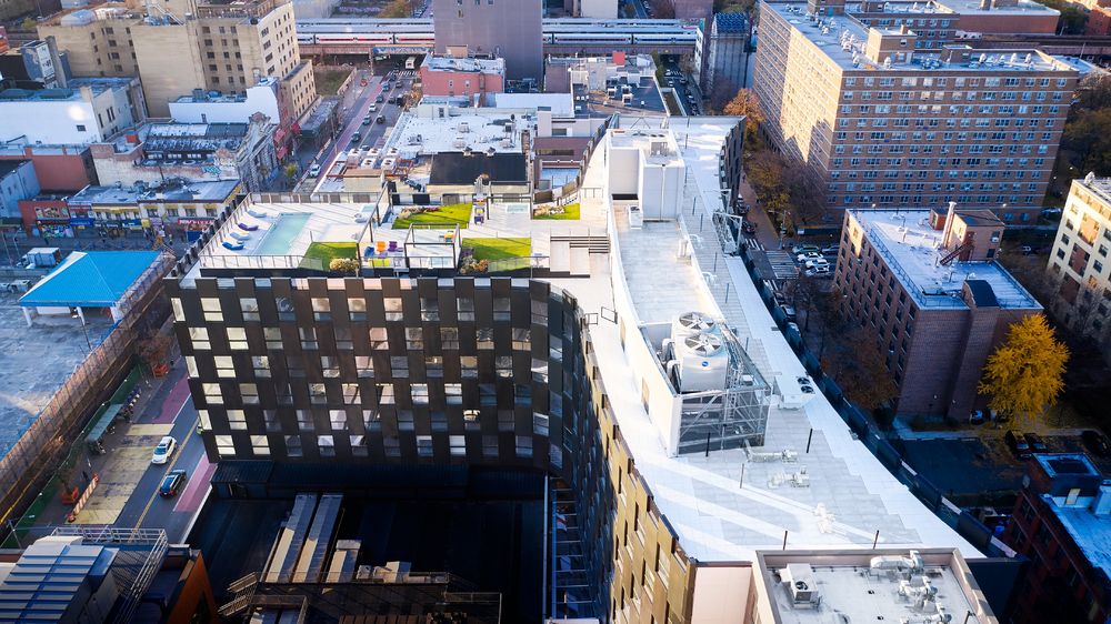 弧形微笑建筑，温馨宜居的 Harlem 新地标