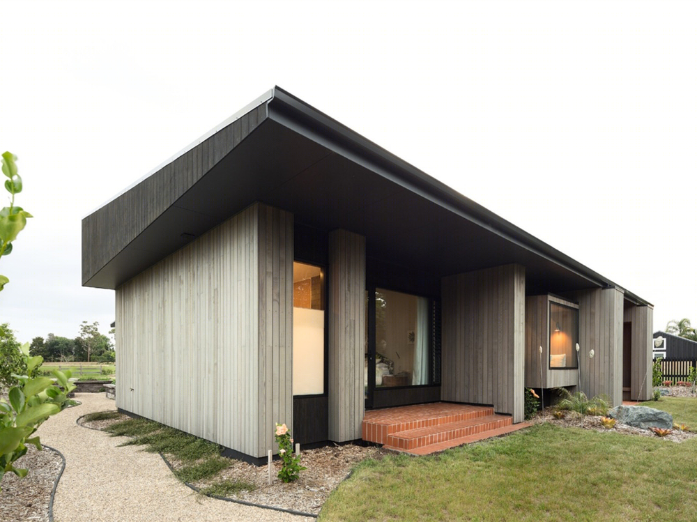 新西兰"檐下"住宅，黑色屋檐的景观视野