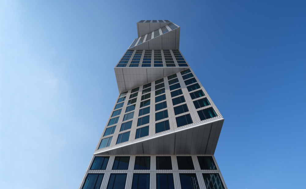 OMA 新作 | 美国 Eagle West 公寓楼，河流交汇处的几何堆叠住宅设计