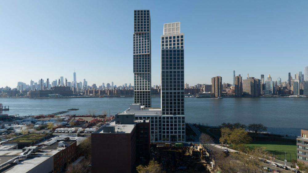OMA 新作 | 美国 Eagle West 公寓楼，河流交汇处的几何堆叠住宅设计