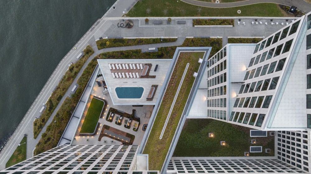 OMA 新作 | 美国 Eagle West 公寓楼，河流交汇处的几何堆叠住宅设计