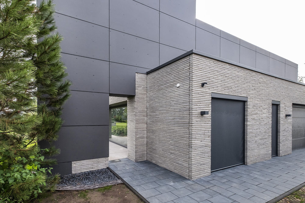 极简现代别墅 | 自然光与 X-Beton 地板的完美融合