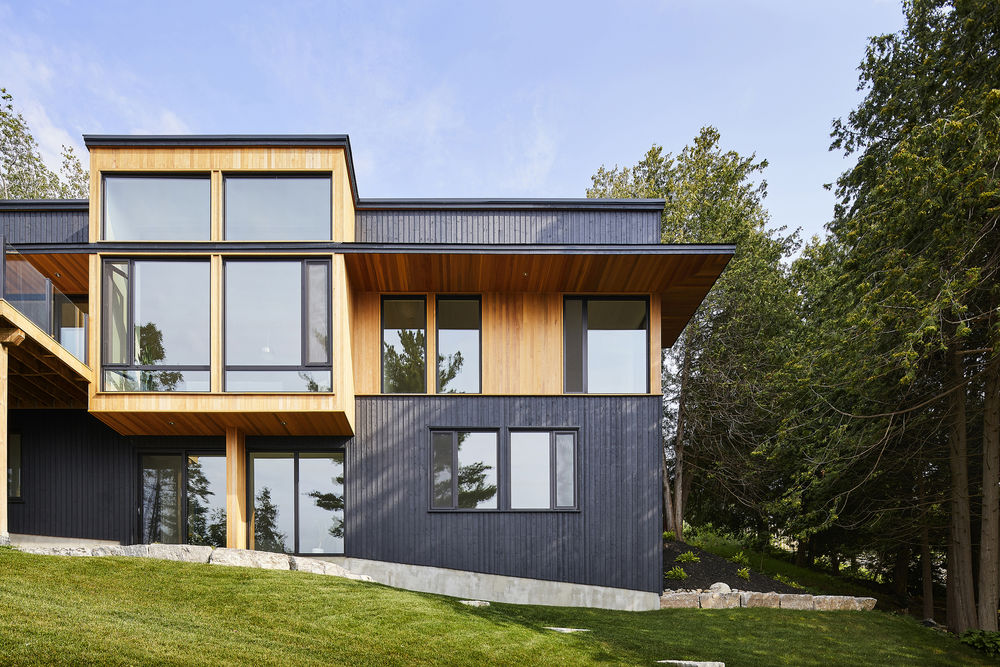 Sturgeon Lake House——嵌入山体的别墅设计