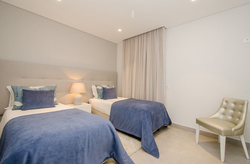 Simple Taste 团队打造 V5 Vilamoura 全屋设计，展现精致生活美学