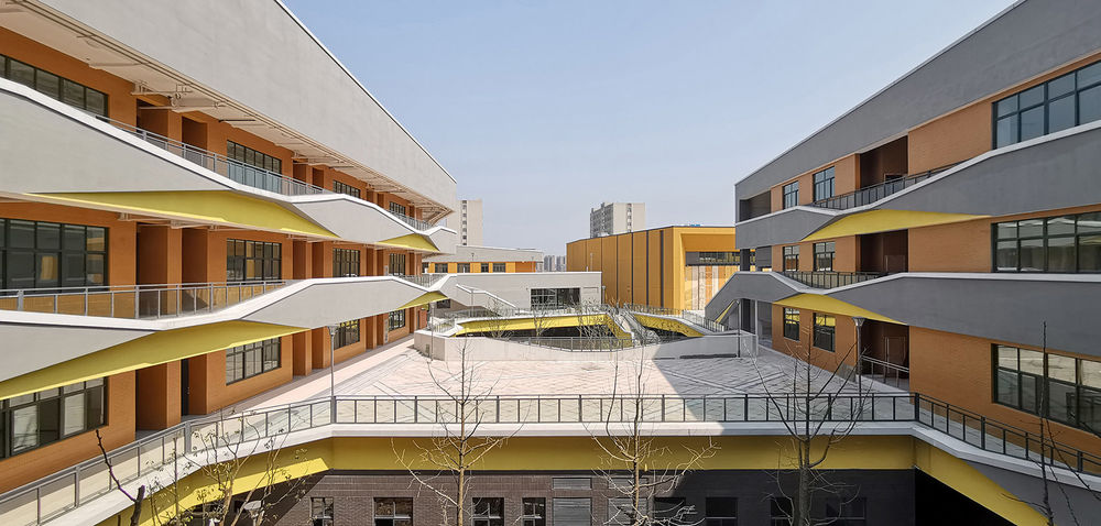 宁波市江北区甬江实验学校 / DC国际 · c+d 设计研究中心