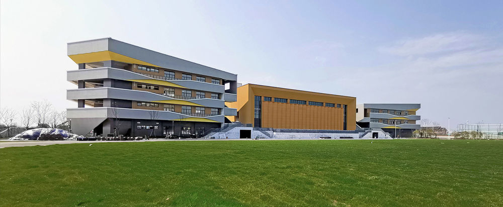 宁波市江北区甬江实验学校 / DC国际 · c+d 设计研究中心