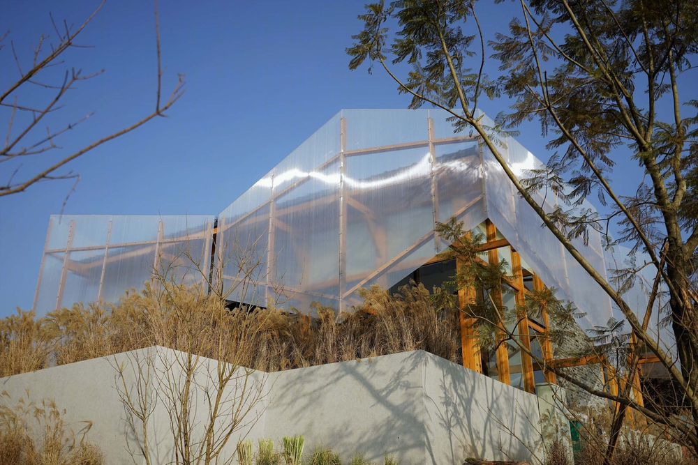 成都麓湖水城游客中心——现代木结构与自然景观的完美融合