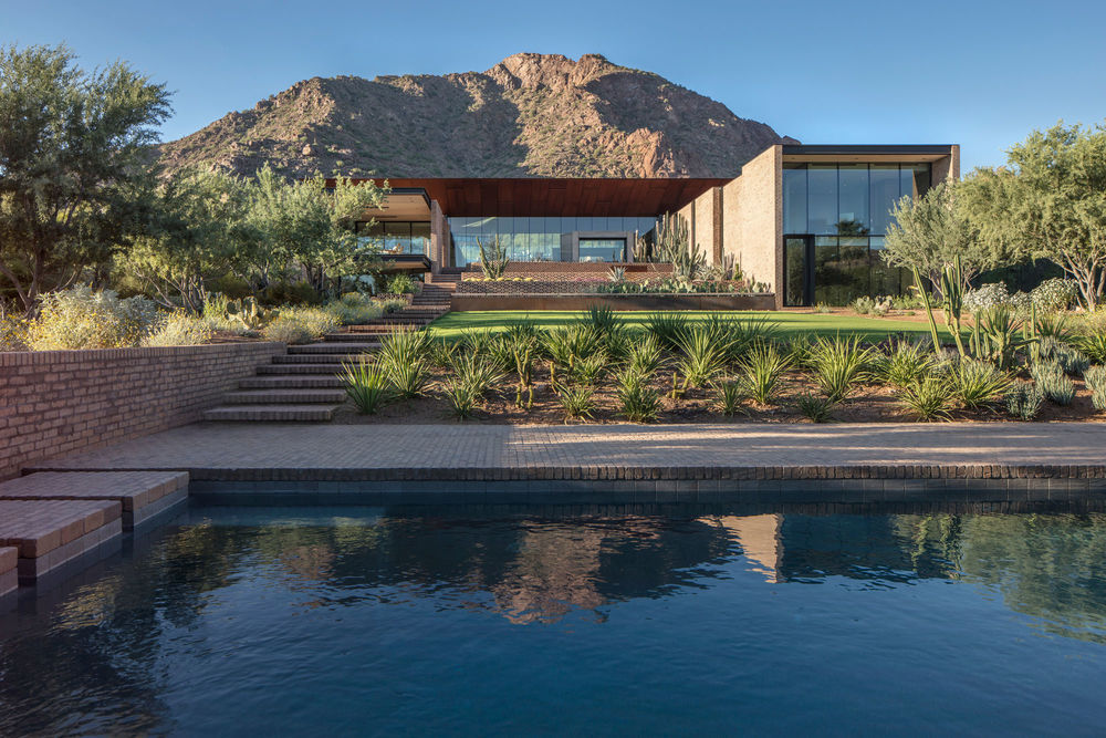 Dazzling in the Desert: Ghost Wash House by A-I-R.