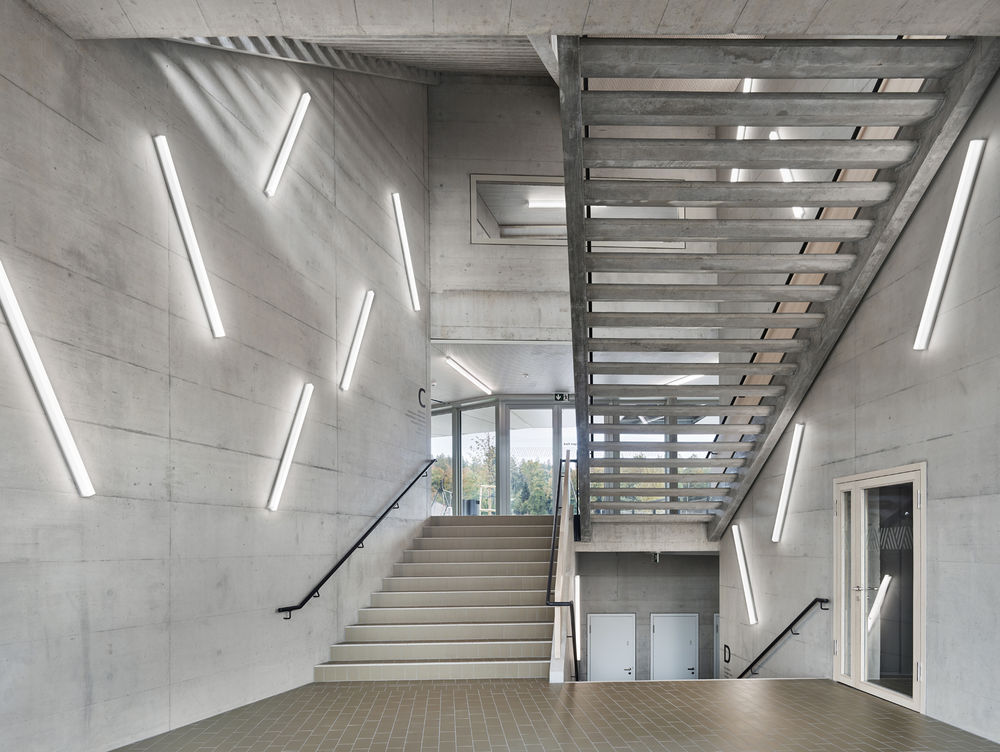 Niederwangen-Ried School and Sports Fields / Büning-Pfaue Kartmann Architekten