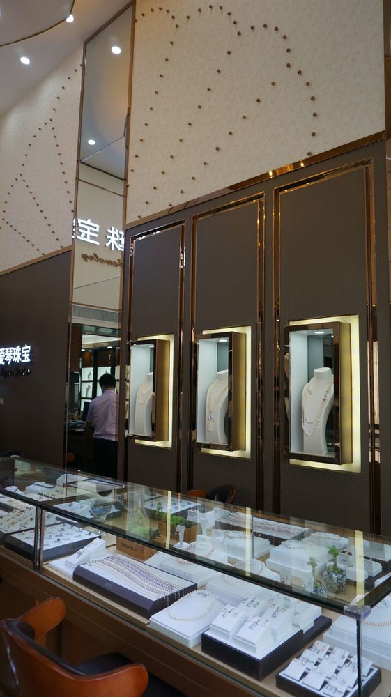 诸立标创意组 爱琴珠宝专卖店