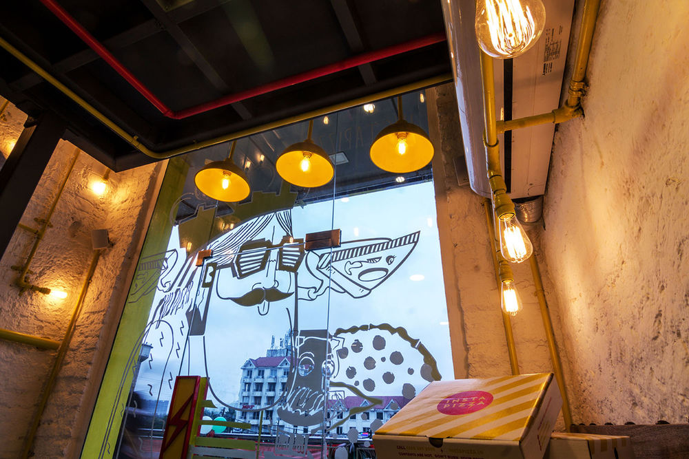 印度 Instapizza 店工业风设计，展现青年活力