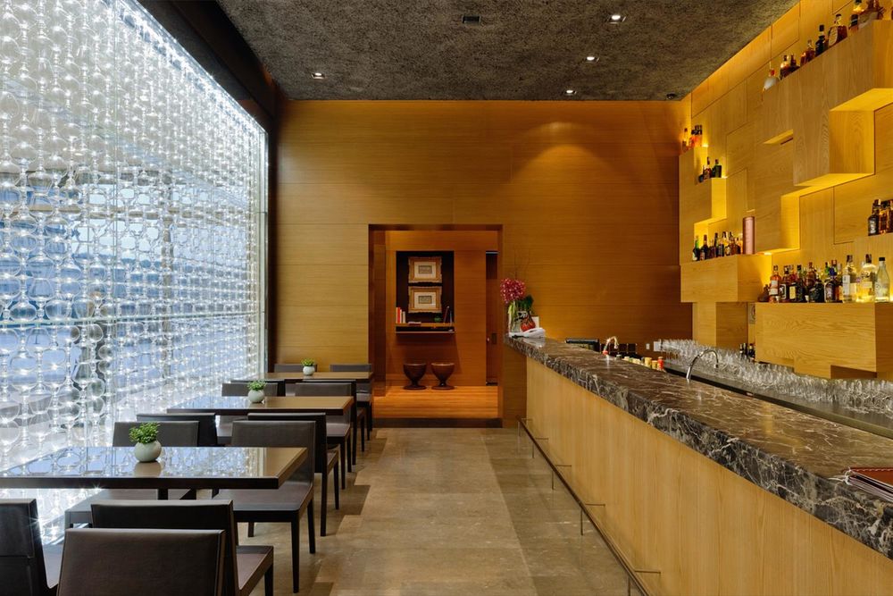 木质格栅营造温馨餐饮空间——巴西 Tre Bicchieri JK 餐厅