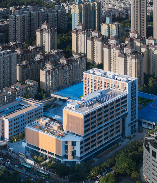 Xi'an Gaoxin No.1 High School Expansion and Social Shared Car Park / Qu Peiqing Studio